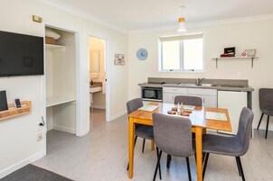 Family Apartment, Patio, Garden View | Dining