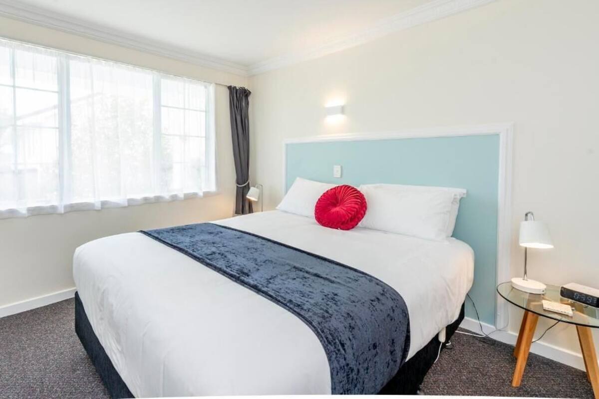 Executive Apartment, Patio, Garden View | Desk, laptop workspace, blackout drapes, iron/ironing board