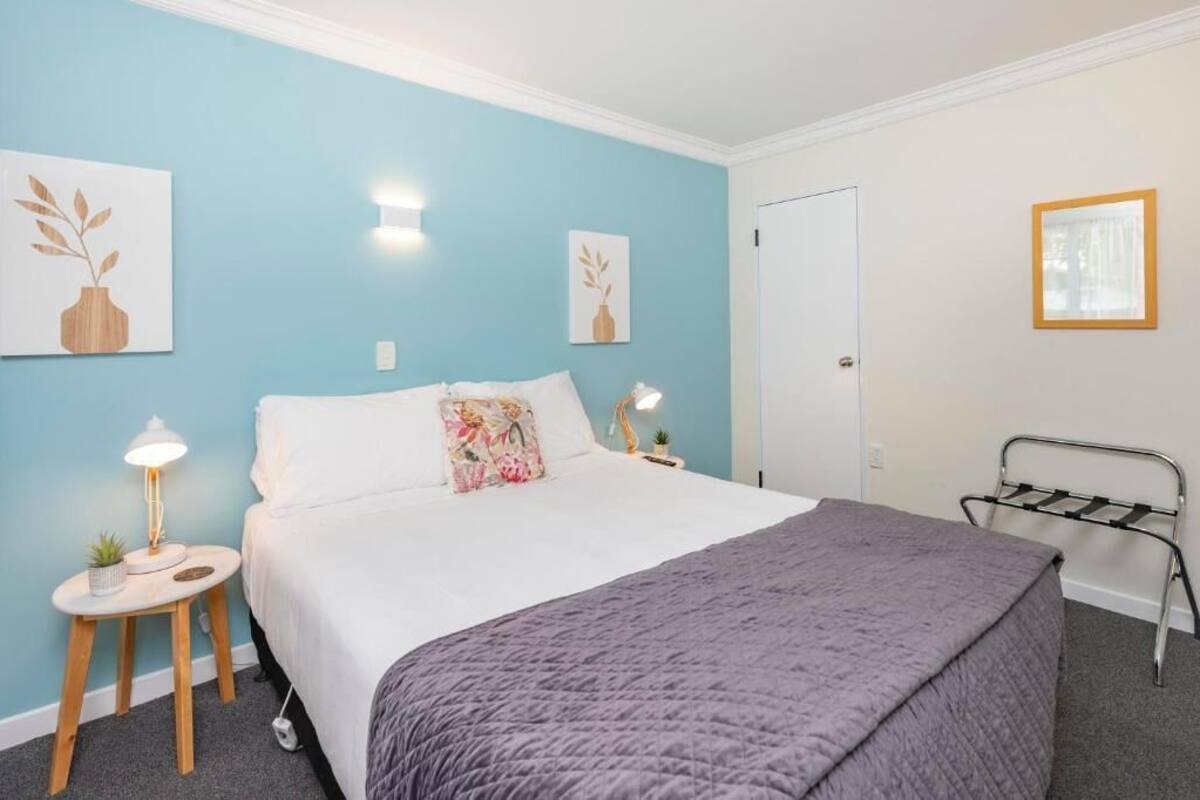 Apartment, 1 Bedroom, Patio, Garden View | Desk, laptop workspace, blackout drapes, iron/ironing board