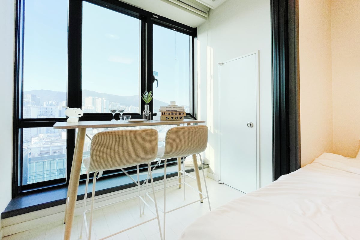 Desk, laptop workspace, blackout curtains, free WiFi