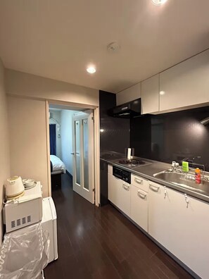 Superior Double Room, City View | Private kitchen - IKIRA Apartment Hotel (Tokyo)