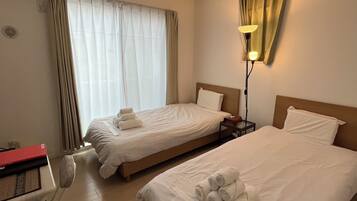 Twin Room, 2 Twin Beds, Lanai, City View | In-room safe, blackout drapes, soundproofing, free WiFi