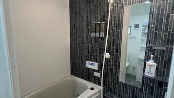 Double Room, 1 Double Bed, Lanai, City View | Bathroom | Separate tub and shower, free toiletries, hair dryer, slippers