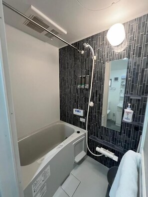 Double Room, 1 Double Bed, Lanai, City View | Bathroom | Separate tub and shower, free toiletries, hair dryer, slippers