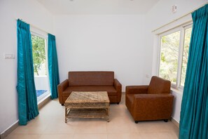 Classic Villa, 1 Bedroom, Garden View | Living area - Thapovan Resort by Z Vacations (Kodaikanal)