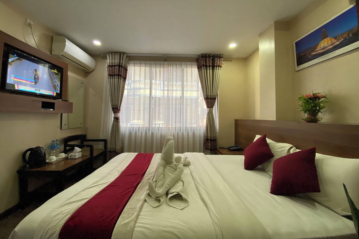 Deluxe Double Room, City View | Desk, laptop workspace, free WiFi
