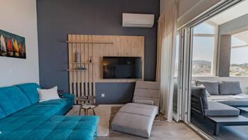 Villa (Three Bedroom Villa) | Living room | 32-inch flat-screen TV with digital channels