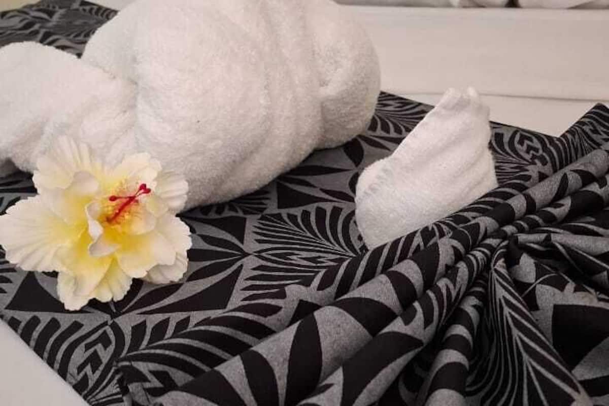 Desk, laptop workspace, blackout drapes, iron/ironing board