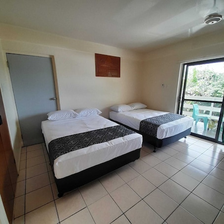 Comfort Double Room, 2 Double Beds, Courtyard View. Samoa Holiday Hotel