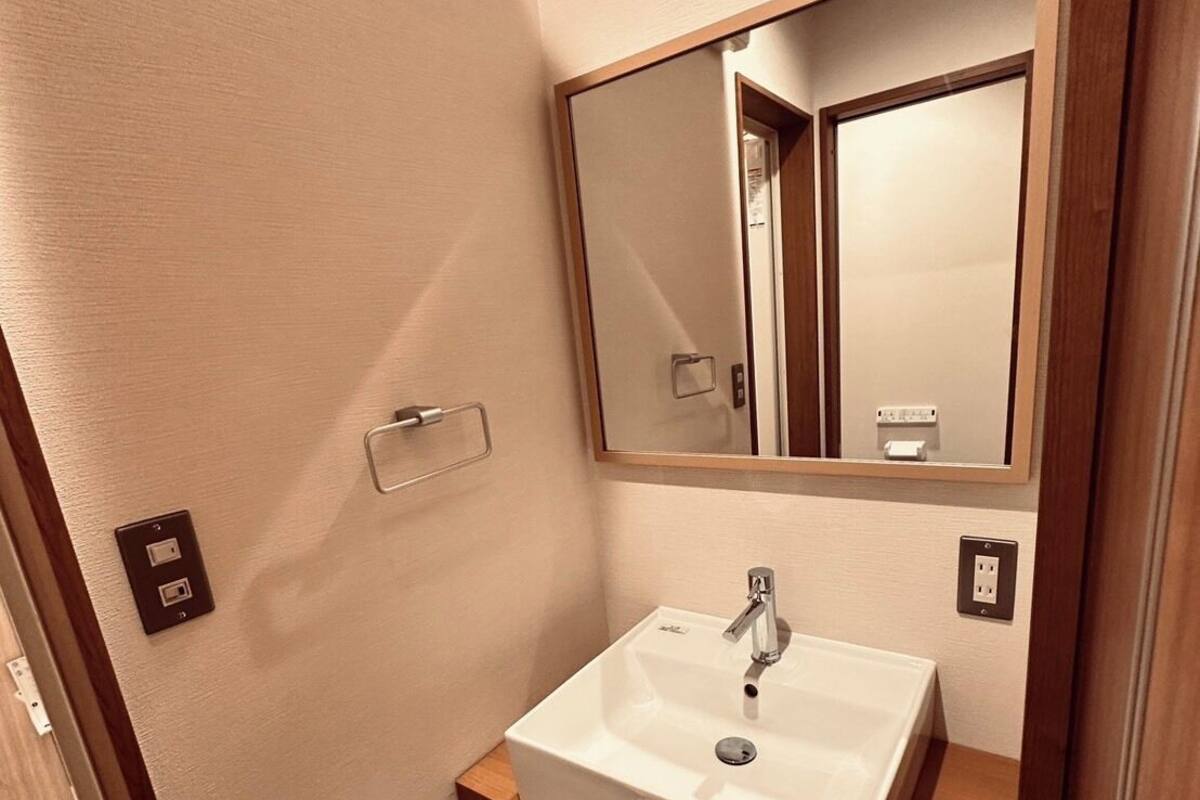 Hair dryer, slippers, towels, soap