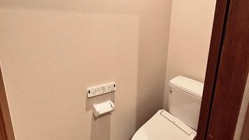 Hair dryer, slippers, towels, soap