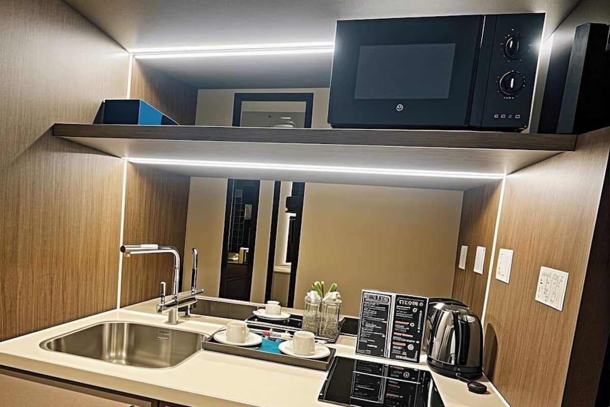 Mini-fridge, microwave, stovetop, high chair