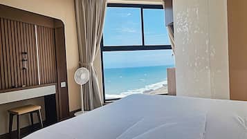 Neljän hengen perhehuone, osittainen valtamerinäköala | Näkymä rannalle/valtamerelle