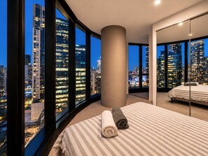 Bask in panoramic views of Southbank from the master bedroom. - Skyline Suites | Stylish Corner Suite, City Views (Southbank)