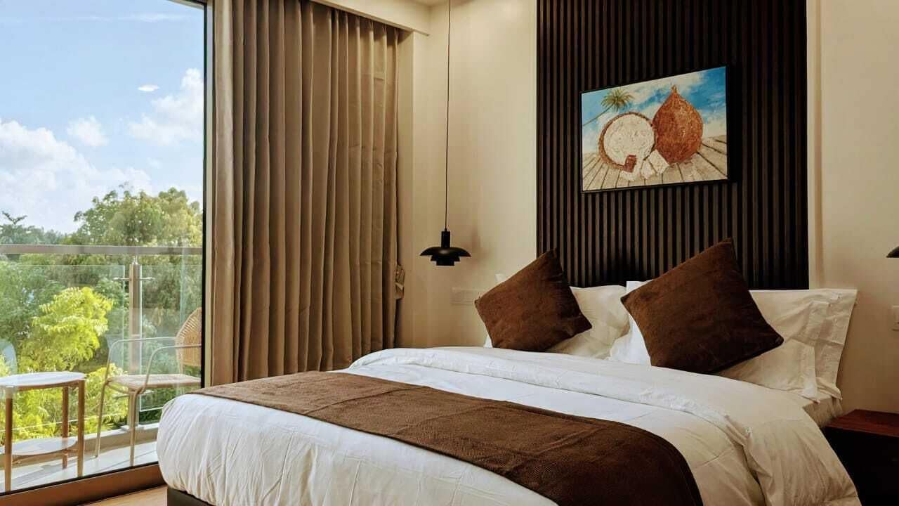 Deluxe Double Room, Balcony, City View | In-room safe, desk, laptop workspace, iron/ironing board