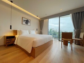 Departamento ejecutivo, vista parcial al océano | Cocineta privada | Frigobar, periquera, utensilios de cocina y condimentos 