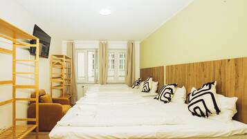 Family Triple Room, Kitchen, City View | Individually decorated, individually furnished, iron/ironing board