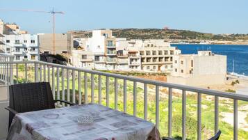 Apartment, Sea View | Outdoor dining