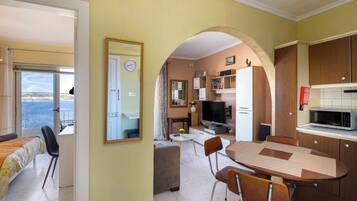 Apartamento, vista para o mar | Opções para refeição