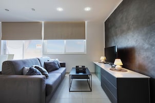 Penthouse, uitzicht op zee | Woonruimte