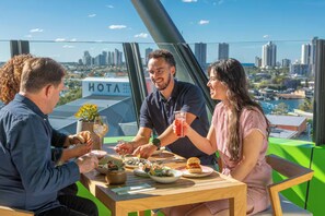 Outdoor dining - Sky Above, Ocean Beyond – Level 43 Panoramic View (Broadbeach)
