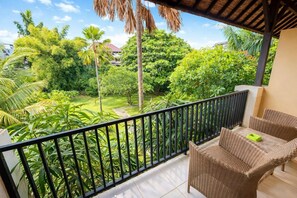 Deluxe Double Room, Balcony, Pool View | Property grounds - Palm 57 Guesthouse (Kuta)