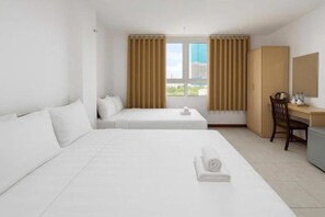 Quarto quádruplo | Wi-Fi de cortesia, roupa de cama