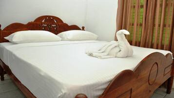 Deluxe Double Room, Balcony, Garden View | In-room safe, desk, laptop workspace, blackout drapes