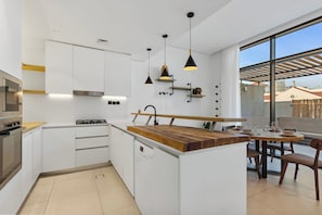 Coffee/tea maker, fridge, microwave, oven - Urban Chic 1 Bedroom w/ big Balcony Kitchen in JVC (Jumeirah Village Circle (JVC))