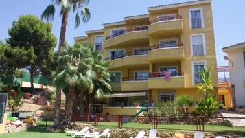 Outdoor pool, open 10:00 AM to 9:00 PM, pool loungers