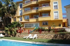 Apartamento família, vista para a piscina | Piscina
