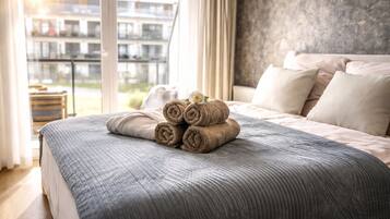 Een strijkplank/strijkijzer, reisbedje, gratis wifi, beddengoed