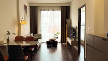 Deluxe Apartment, 2 Bedrooms, Balcony | Individually decorated, individually furnished, desk, laptop workspace