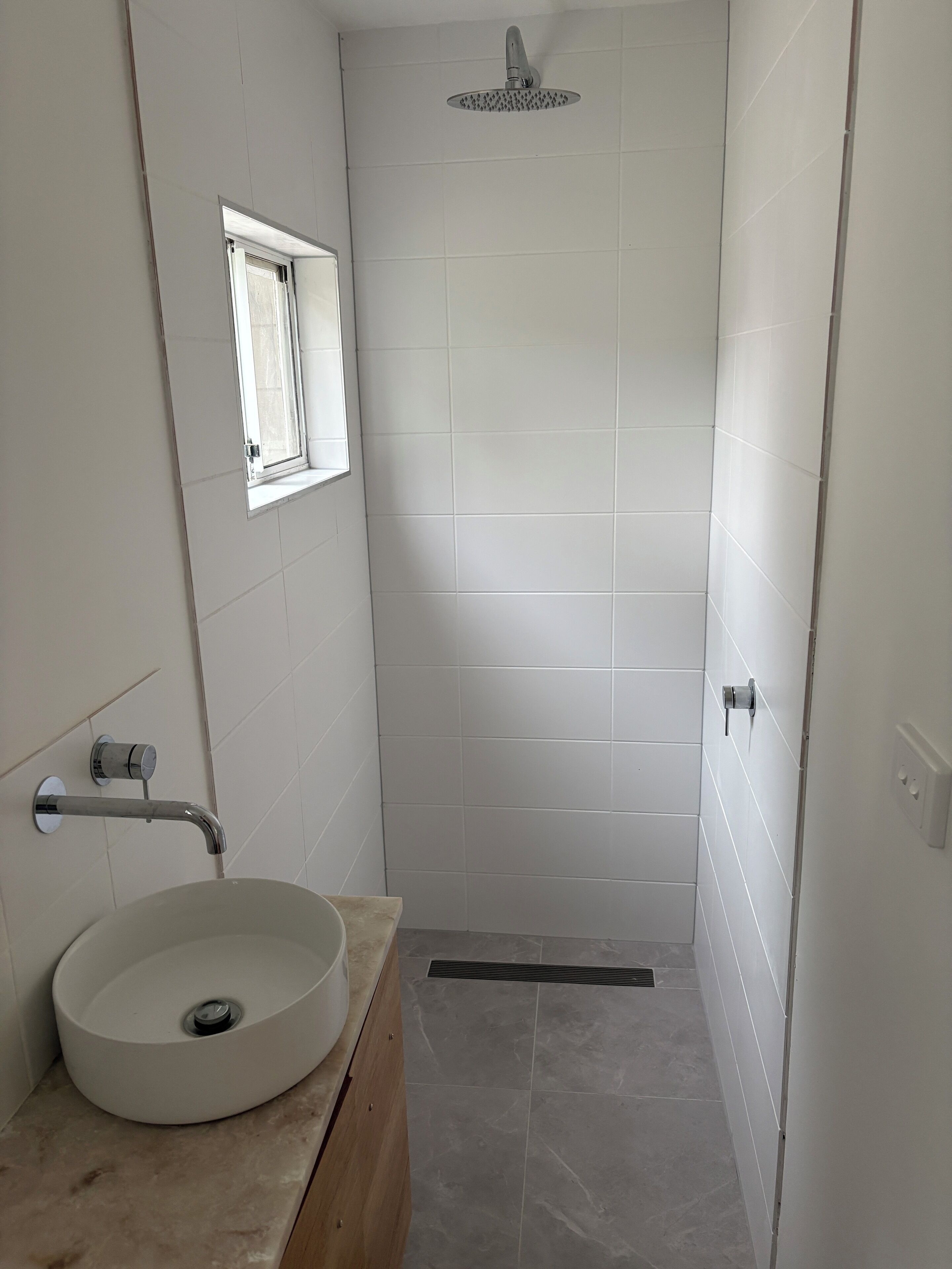 Shower, towels, soap, toilet paper