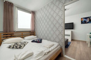 1 chambre, fer et planche à repasser, lit parapluie, Wi-Fi