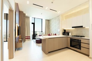 Deluxe Apartment, Balcony, City View | Private kitchen | Espresso maker, coffee/tea maker, electric kettle, highchair - Exclusive High-Floor Apartment  (Dubai)