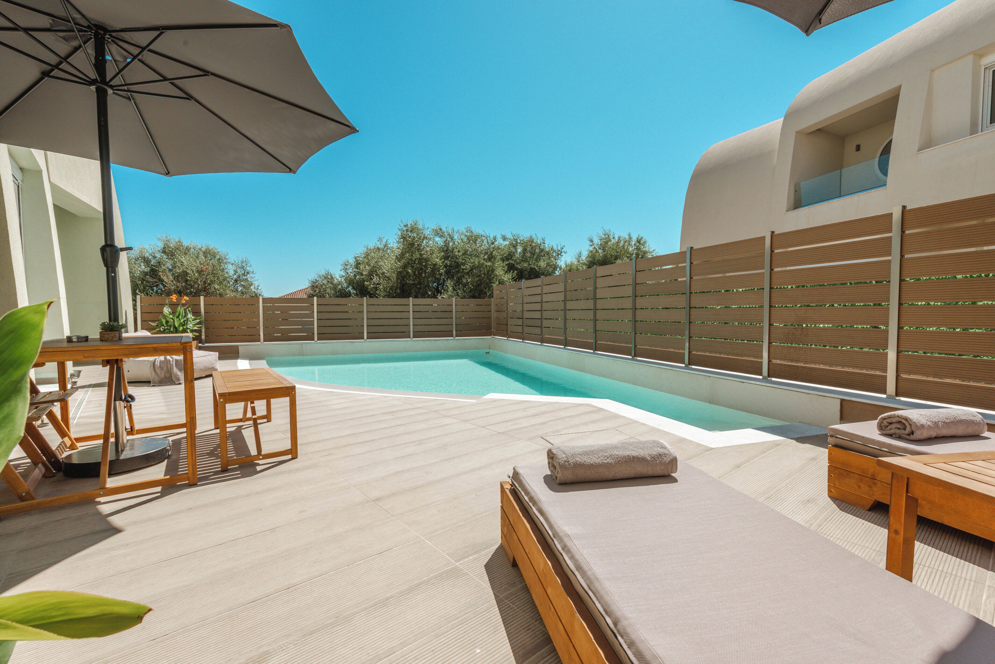 Outdoor pool, pool umbrellas, pool loungers