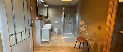 Shower, hair dryer, towels, soap