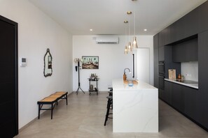 Appartamento, vista città | Cucina privata