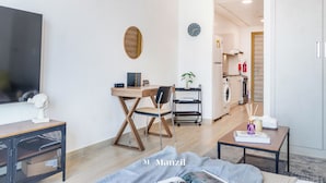 Unclassified image, 4 of 14, button - Manzil - Sleek Studio with Pool in JVC (Dubai)