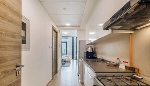 Luxury Studio, City View | Private kitchen - Manzil - Sleek Studio with Pool in JVC (Dubai)