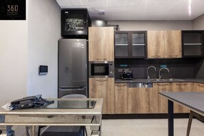 Frigorifero, microonde, forno, macchina per tè/caffè