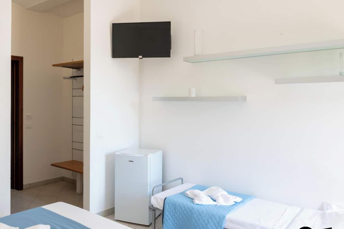 Quarto triplo conforto | Wi-Fi de cortesia