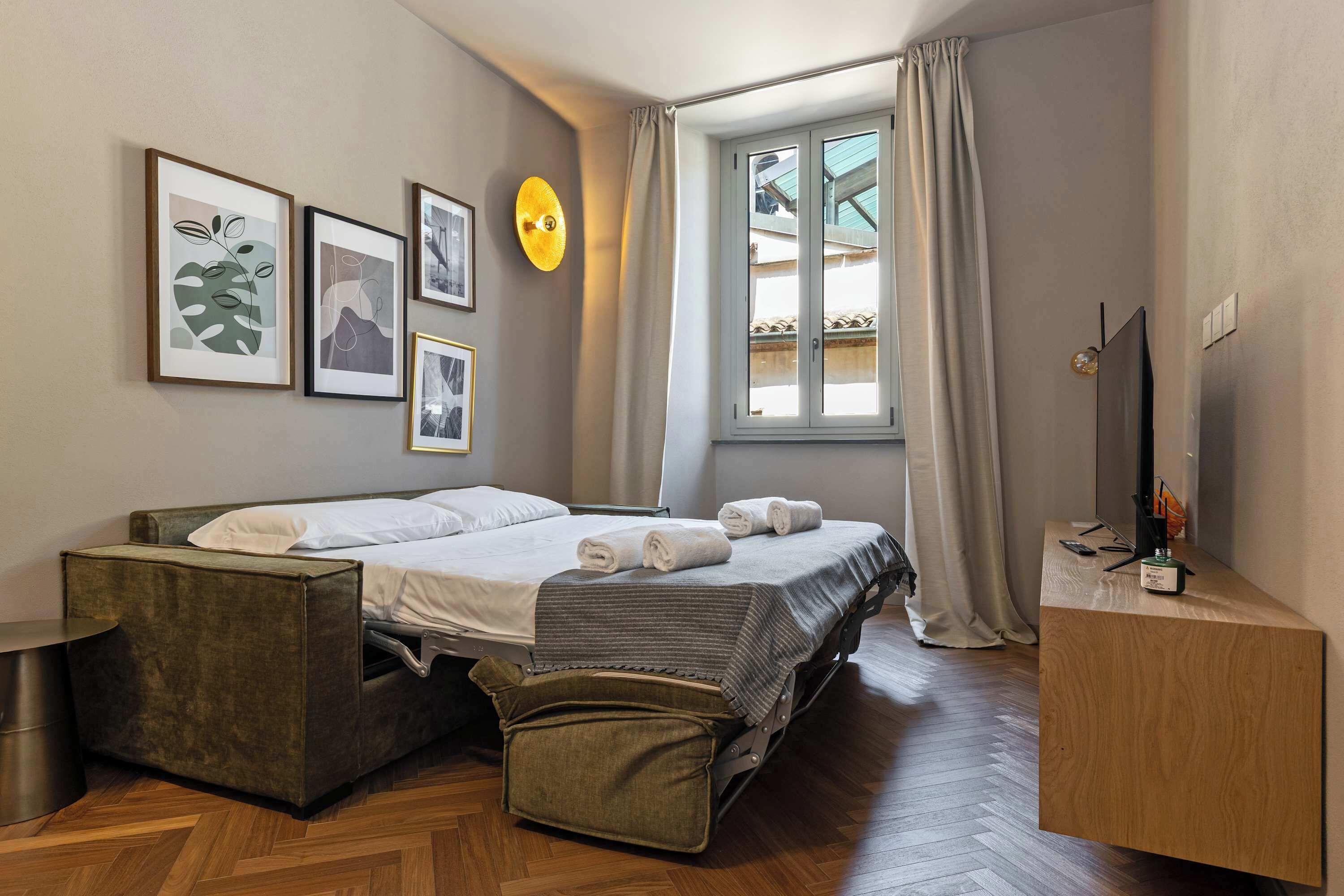 1 dormitorio, tabla de planchar con plancha, cuna de viaje y wifi
