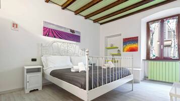 1 chambre, fer et planche Ă repasser, lit parapluie, draps fournis