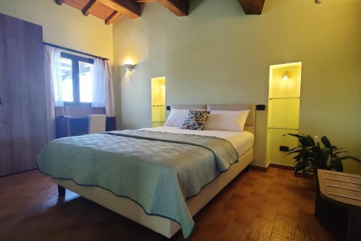 Deluxe Apartment, Garden View | In-room safe, desk, free WiFi