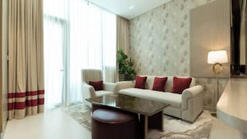 Deluxe Apartment, Balcony, City View | Living area | 65-inch Smart TV with digital channels, Netflix, streaming services