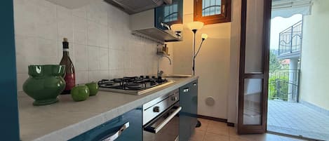 Fridge, microwave, cookware/dishes/utensils