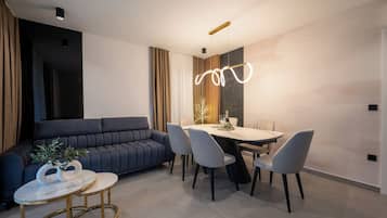 Penthouse Deluxe, 3 chambres, vue jardin | Restauration