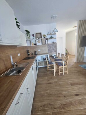 Private kitchen - BEACHFRONT 
Large terraces • Sea view • Quiet location • Renovated (Grebaštica)